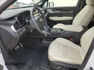 2023 Cadillac XT6 AWD Sport with VIN 1GYKPGRS1PZ142911, listed as a Copart auction lot 63526074 with 21,982 mi miles and Clean Title. Bid and sale history available at carsss.com. Image 7.