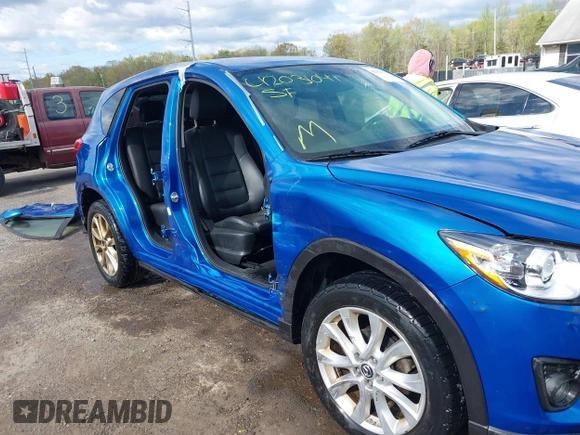 2013 Mazda CX-5 Grand Touring with VIN JM3KE4DE4D0123837, listed as a IAAI auction lot 42031074 with 121,818 mi miles. Bid and sale history available at carsss.com. Image 6.
