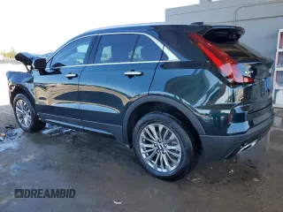 2024 Cadillac XT4 FWD Premium Luxury z VIN 1GYFZCR43RF241465, wystawiony jako Copart lot #49428795 z przebiegiem Nie podano mil oraz Szkoda całkowita • Salvage title. Historia ofert i sprzedaży dostępna na DreamBid. Obrazek 2.