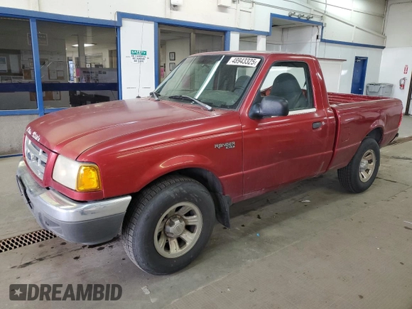 2001 Ford Ranger XL with VIN 1FTYR10C61TA40124, listed as a Copart auction lot 48943325 with 196,810 mi miles and Salvage title. Bid and sale history available at DreamBid. Image 1.