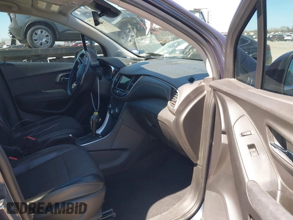 2019 Chevrolet Trax LT with VIN 3GNCJLSB2KL171842, listed as a IAAI auction lot 41850333 with 87,478 mi miles and . Bid and sale history available at carsss.com. Image 5.