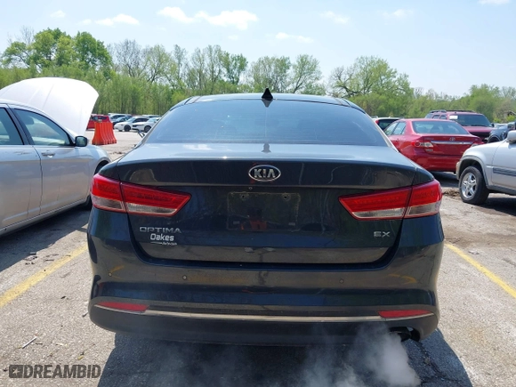 2016 Kia Optima EX with VIN 5XXGU4L38GG022501, listed as a IAAI auction lot 42071944 with 122,502 mi miles. Bid and sale history available at carsss.com. Image 16.