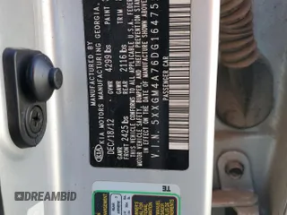 2013 Kia Optima LX z VIN 5XXGM4A76DG164752, wystawiony jako Copart lot #42209365 z przebiegiem 218 024 mil mil oraz Szkoda całkowita • Salvage title. Historia ofert i sprzedaży dostępna na DreamBid. Obrazek 14.