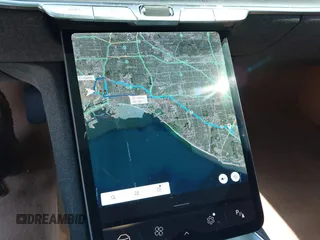 2023 Lucid Air Grand Touring z VIN 50EA1GBA0PA004565, wystawiony jako IAAI lot #41913843 z przebiegiem 25 468 mil mil oraz . Historia ofert i sprzedaży dostępna na DreamBid. Obrazek 19.