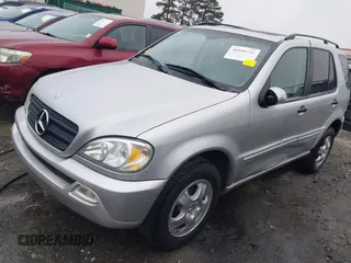 2002 Mercedes-Benz M-Class with VIN 4JGAB54E92A352889, listed as a IAAI auction lot 41805001 with 174,758 mi miles. Bid and sale history available at carsss.com. Image 2.