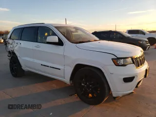 2022 Jeep Grand Cherokee Laredo X with VIN 1C4RJEAG4NC154150, listed as a Copart auction lot 42042685 with 64,155 mi miles and Salvage title. Bid and sale history available at DreamBid. Image 4.