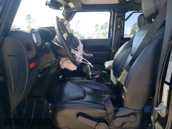 2016 Jeep Wrangler Unlimited Rubicon Hard Rock with VIN 1C4BJWFG9GL209484, listed as a Copart auction lot 87815475 with 85,729 mi miles and Salvage Title. Bid and sale history available at carsss.com. Image 7.