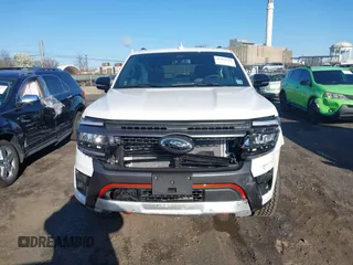 2024 Ford Expedition Timberline with VIN 1FMJU1RG1REB10629, listed as a IAAI auction lot 41974714 with 1,232 mi miles and . Bid and sale history available at DreamBid. Image 12.