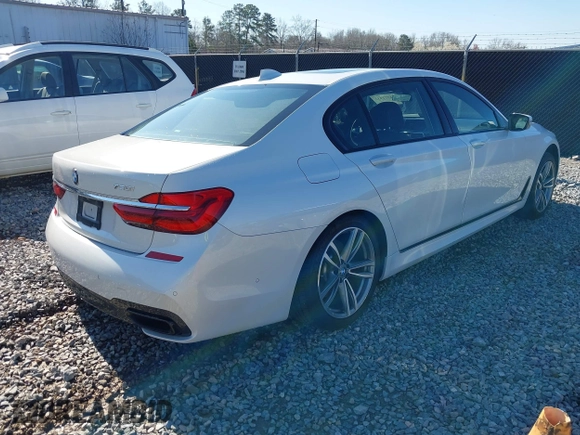 2017 BMW 7 Series 750i with VIN WBA7F0C34HGM21738, listed as a IAAI auction lot 41772933 with 62,923 mi miles and . Bid and sale history available at DreamBid. Image 4.