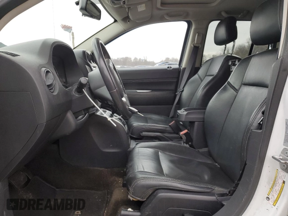2017 Jeep Compass High Altitude with VIN 1C4NJDEBXHD103273, listed as a Copart auction lot 44627835 with 103,887 mi miles and Salvage Title. Bid and sale history available at DreamBid. Image 7.