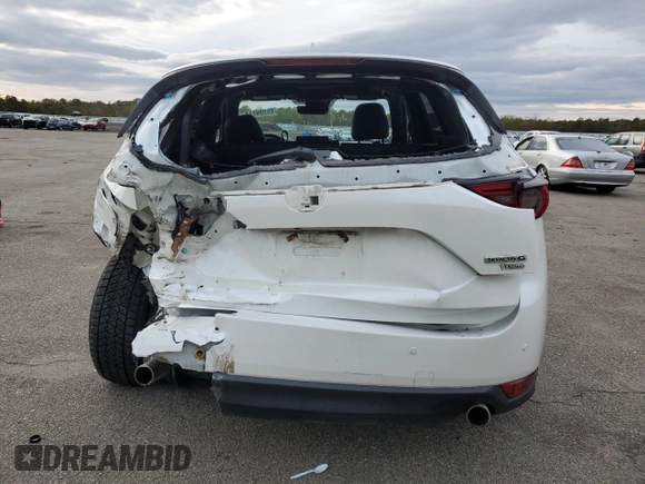 2021 Mazda CX-5 Signature with VIN JM3KFBEY5M0421694, listed as a Copart auction lot 85709714 with 28,126 mi miles and Salvage Title. Bid and sale history available at carsss.com. Image 6.