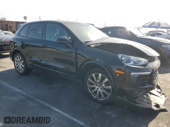 2017 Porsche Cayenne with VIN WP1AA2A20HKA80640, listed as a Copart auction lot 61038585 with 60,893 mi miles and Salvage title. Bid and sale history available at DreamBid. Image 4.