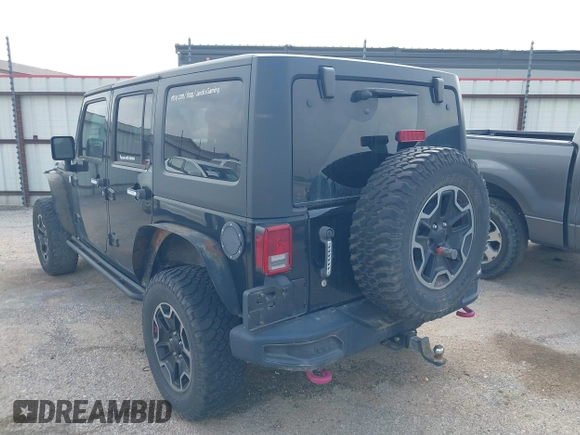 2015 Jeep Wrangler Unlimited Rubicon z VIN 1C4BJWFG2FL572417, wystawiony jako IAAI lot #41895927 z przebiegiem 54 981 mil mil oraz . Historia ofert i sprzedaży dostępna na DreamBid. Obrazek 3.