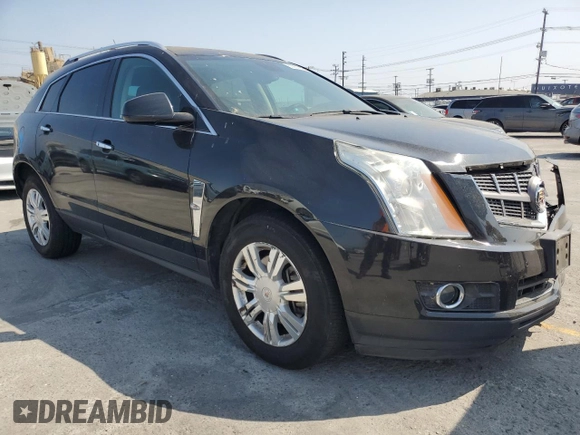 2012 Cadillac SRX Luxury Collection z VIN 3GYFNAE38CS638136, wystawiony jako Copart lot #60292655 z przebiegiem 124 569 mil mil oraz Szkoda całkowita • Salvage title. Historia ofert i sprzedaży dostępna na DreamBid. Obrazek 4.