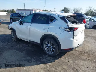 2020 Mazda CX-5 Grand Touring with VIN JM3KFBDM6L0751471, listed as a IAAI auction lot 41914849 with Not Provided miles and . Bid and sale history available at carsss.com. Image 3.