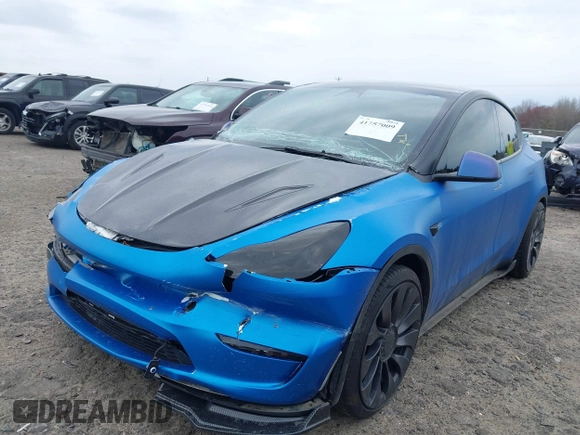 2021 Tesla Model Y Performance z VIN 5YJYGDEF8MF209819, wystawiony jako IAAI lot #41757009 z przebiegiem 37 685 mil mil oraz . Historia ofert i sprzedaży dostępna na DreamBid. Obrazek 24.