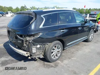 2015 Infiniti QX60 with VIN 5N1AL0MM7FC543874, listed as a IAAI auction lot 42010792 with 163,250 mi miles and . Bid and sale history available at DreamBid. Image 4.
