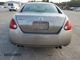 2004 Nissan Maxima SE with VIN 1N4BA41E24C878448, listed as a Copart auction lot 72596984 with 329,525 mi miles and Salvage Title. Bid and sale history available at carsss.com. Image 6.