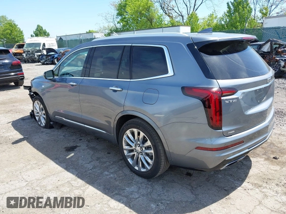 2022 Cadillac XT6 Premium Luxury z VIN 1GYKPDRS4NZ146284, wystawiony jako IAAI lot #42150678 z przebiegiem 28 890 mil mil oraz . Historia ofert i sprzedaży dostępna na DreamBid. Obrazek 3.