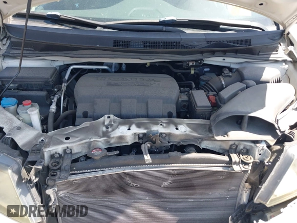 2015 Honda Odyssey EX-L with VIN 5FNRL5H67FB017554, listed as a IAAI auction lot 41974821 with 76,130 mi miles and . Bid and sale history available at carsss.com. Image 10.