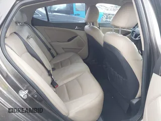 2013 Kia Optima EX z VIN 5XXGN4A79DG181719, wystawiony jako IAAI lot #42372478 z przebiegiem 166 410 mil mil oraz . Historia ofert i sprzedaży dostępna na DreamBid. Obrazek 8.