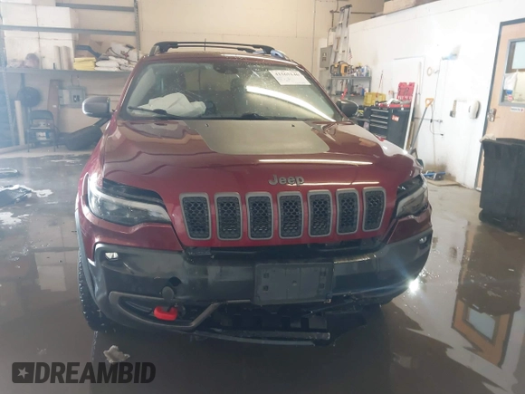 2021 Jeep Cherokee Trailhawk with VIN 1C4PJMBX4MD206997, listed as a IAAI auction lot 41565140 with Not provided miles and . Bid and sale history available at DreamBid. Image 6.