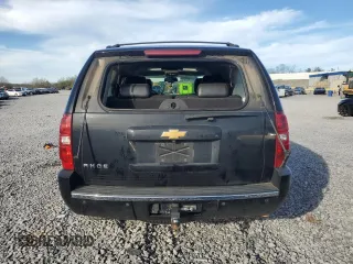2013 Chevrolet Tahoe LTZ with VIN 1GNSCCE04DR162474, listed as a Copart auction lot 49386335 with 331,358 mi miles and Salvage title. Bid and sale history available at DreamBid. Image 6.