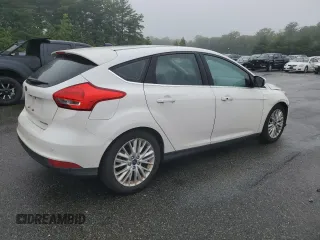 2016 Ford Focus Titanium with VIN 1FADP3N2XGL321275, listed as a Copart auction lot 61282845 with 111,519 mi miles and Salvage title. Bid and sale history available at DreamBid. Image 3.