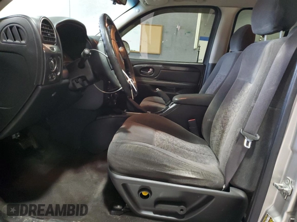 2005 GMC Envoy SLT with VIN 1GKDT13S652197929, listed as a Copart auction lot 42104855 with 228,515 mi miles and Salvage Title. Bid and sale history available at carsss.com. Image 7.