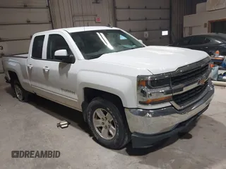 2018 Chevrolet Silverado 1500 LT with VIN 1GCVKREHXJZ165358, listed as a IAAI auction lot 40216259 with 107,983 mi miles and . Bid and sale history available at DreamBid. Image 1.