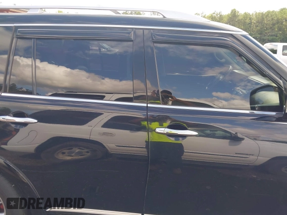 2012 Infiniti QX56 7-passenger z VIN JN8AZ2NEXC9017449, wystawiony jako IAAI lot #42349105 z przebiegiem 244 048 mil mil oraz . Historia ofert i sprzedaży dostępna na DreamBid. Obrazek 13.