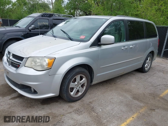 2011 Dodge Grand Caravan Crew with VIN 2D4RN5DG7BR786789, listed as a IAAI auction lot 42141124 with 167,353 mi miles and . Bid and sale history available at DreamBid. Image 2.