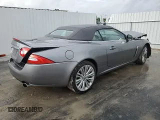2010 Jaguar XK with VIN SAJWA4GB4ALB37114, listed as a Copart auction lot 77673824 with 99,999 mi miles and Salvage Title. Bid and sale history available at carsss.com. Image 3.