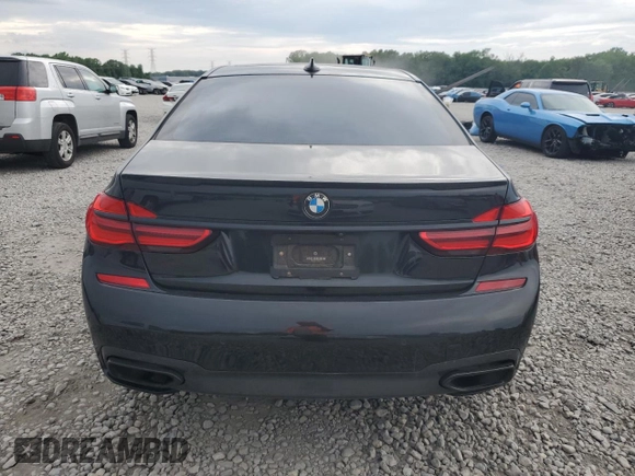 2018 BMW 7 Series 740e xDrive with VIN WBA7J2C59JB246238, listed as a Copart auction lot 53777335 with 76,642 mi miles and Salvage Title. Bid and sale history available at carsss.com. Image 6.