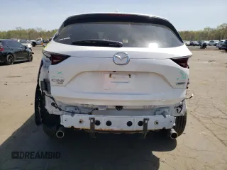 2018 Mazda CX-5 Touring with VIN JM3KFBCMXJ0389773, listed as a Copart auction lot 54737795 with 82,103 mi miles and Salvage Title. Bid and sale history available at DreamBid. Image 6.