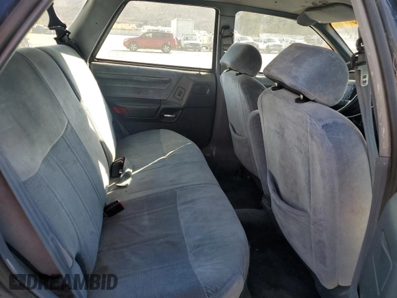 1990 Ford Taurus z VIN 1FACP5747LA124012, wystawiony jako Copart lot #85290054 z przebiegiem 118 017 mil mil oraz Czysty tytuł • Clean title. Historia ofert i sprzedaży dostępna na DreamBid. Obrazek 10.