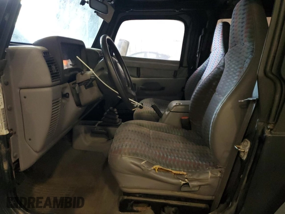 1997 Jeep Wrangler Sport with VIN 1J4FY19S8VP471139, listed as a Copart auction lot 60664255 with 126,710 mi miles and Clean title. Bid and sale history available at DreamBid. Image 7.