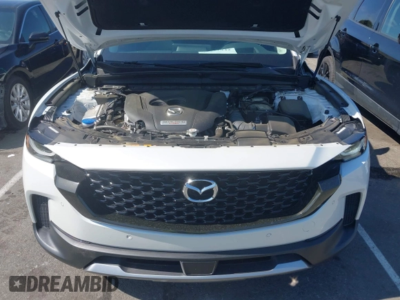 2024 Mazda CX-50 Premium Plus with VIN 7MMVABEY9RN207368, listed as a IAAI auction lot 42211942 with 13,940 mi miles and . Bid and sale history available at DreamBid. Image 10.