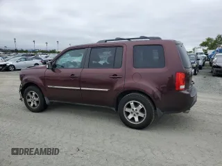 2011 Honda Pilot Touring z VIN 5FNYF3H92BB039165, wystawiony jako Copart lot #59596105 z przebiegiem 182 944 mil mil oraz Szkoda całkowita • Salvage title. Historia ofert i sprzedaży dostępna na DreamBid. Obrazek 2.