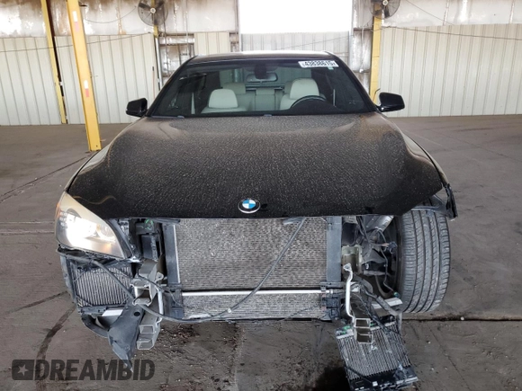 2011 BMW 7 Series 740i with VIN WBAKA4C50BC613240, listed as a Copart auction lot 43838615 with 70,509 mi miles and Salvage Title. Bid and sale history available at carsss.com. Image 5.