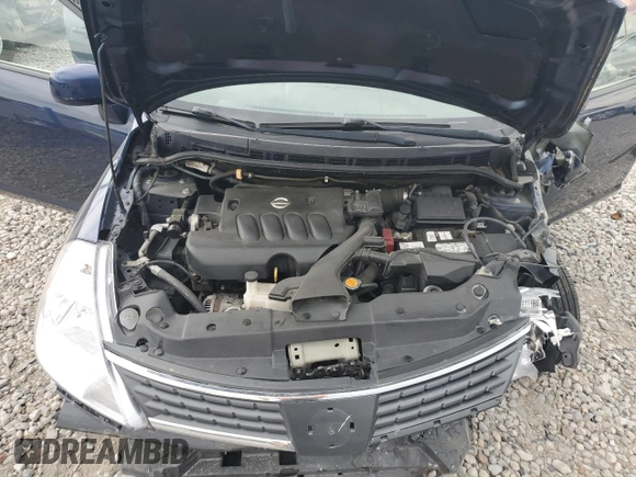 2009 Nissan Versa S with VIN 3N1BC11E19L433572, listed as a Copart auction lot 54084215 with 144,178 mi miles and Salvage title. Bid and sale history available at DreamBid. Image 11.