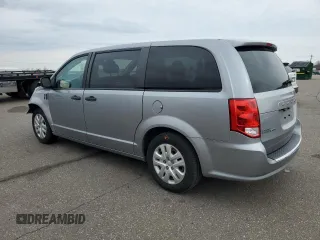 2019 Dodge Grand Caravan SE with VIN 2C4RDGBGXKR642247, listed as a Copart auction lot 54124295 with 153,163 mi miles and Salvage Title. Bid and sale history available at DreamBid. Image 2.