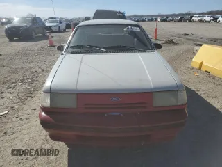 1992 Ford Tempo GL z VIN 2FAPP36XXNB207779, wystawiony jako Copart lot #49348685 z przebiegiem 526 491 mil mil oraz Tytuł czysty. Historia ofert i sprzedaży dostępna na DreamBid. Obrazek 5.