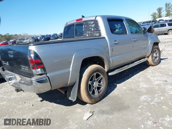 2014 Toyota Tacoma PreRunner with VIN 5TFJU4GNXEX061808, listed as a IAAI auction lot 41585931 with 214,240 mi miles. Bid and sale history available at carsss.com. Image 4.
