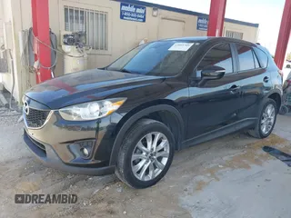 2015 Mazda CX-5 Grand Touring with VIN JM3KE4DY7F0481883, listed as a IAAI auction lot 42091709 with 184,248 mi miles and . Bid and sale history available at DreamBid. Image 18.