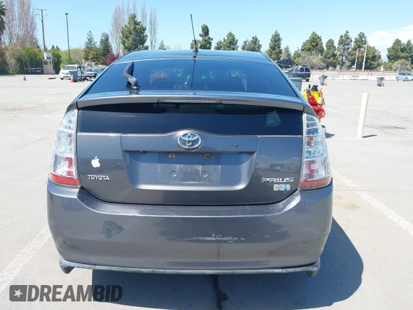 2007 Toyota Prius z VIN JTDKB20U273215633, wystawiony jako IAAI lot #41955538 z przebiegiem 172 957 mil mil oraz . Historia ofert i sprzedaży dostępna na DreamBid. Obrazek 16.