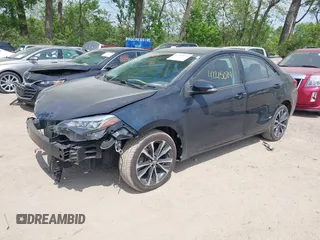 2018 Toyota Corolla L with VIN 2T1BURHE1JC111066, listed as a IAAI auction lot 42215074 with 106,677 mi miles and . Bid and sale history available at DreamBid. Image 2.