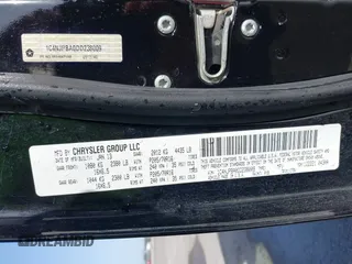 2013 Jeep Patriot Sport with VIN 1C4NJPBA0DD238009, listed as a IAAI auction lot 42301422 with 103,359 mi miles and . Bid and sale history available at DreamBid. Image 9.