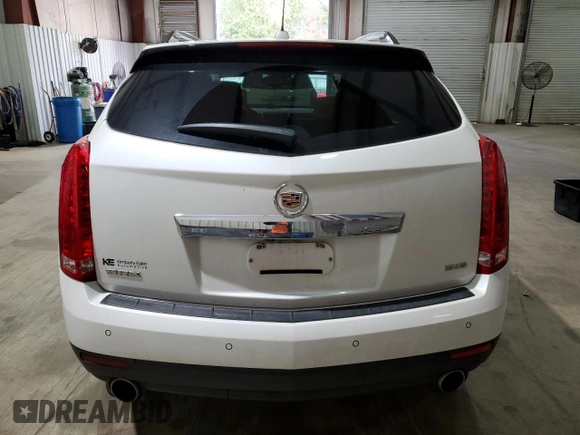 2016 Cadillac SRX Performance Collection with VIN 3GYFNCE36GS525836, listed as a Copart auction lot 84502634 with 94,639 mi miles and Salvage title. Bid and sale history available at DreamBid. Image 6.