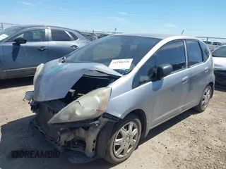 2009 Honda Fit with VIN JHMGE88249S036133, listed as a IAAI auction lot 41788358 with 128,613 mi miles. Bid and sale history available at carsss.com. Image 2.